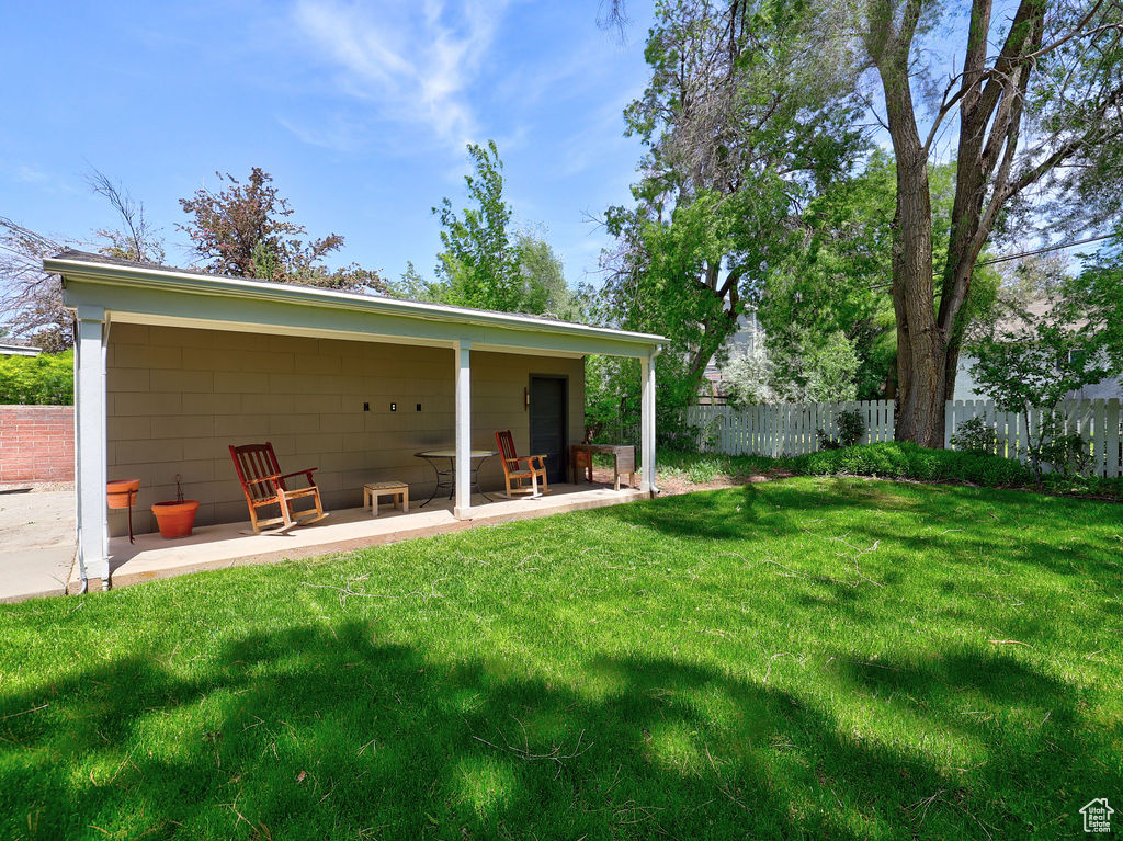 Rear view of house with a patio