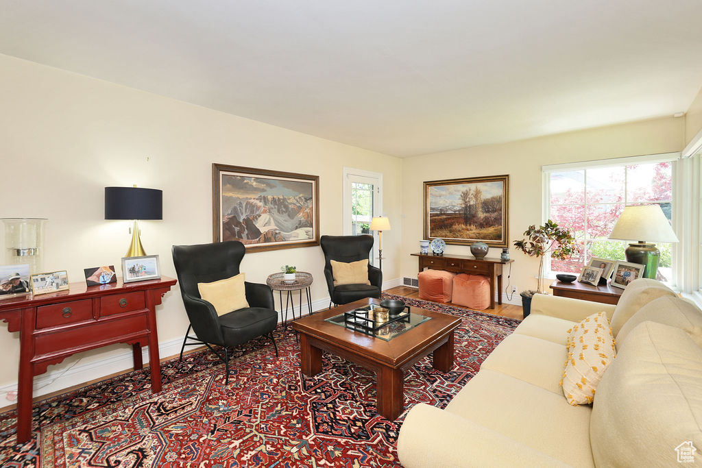 Living area featuring baseboards