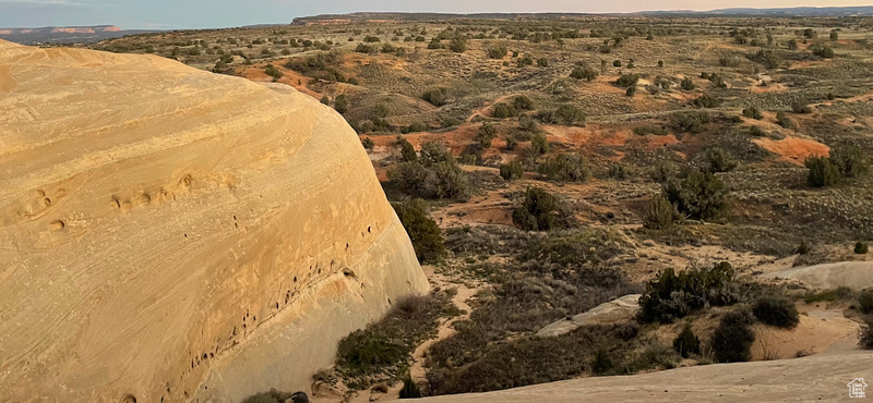 View of property location featuring a desert landscape