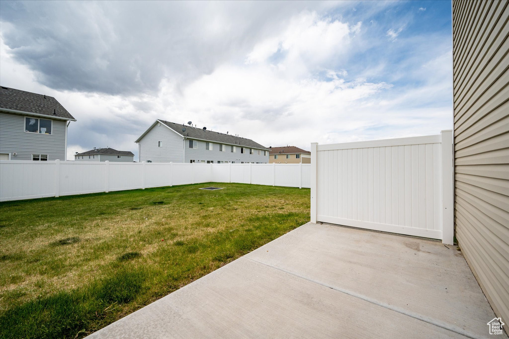 View of yard with a patio area