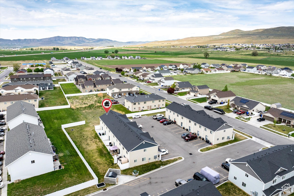 Aerial view of residential area with mountains