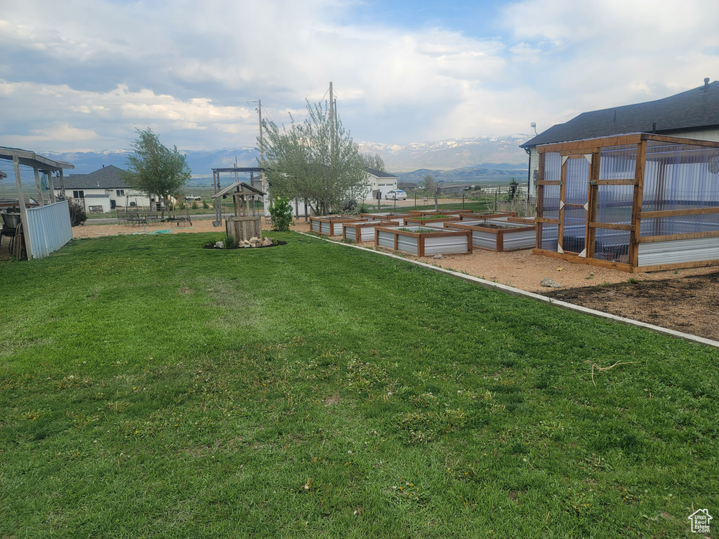 View of yard featuring a vegetable garden