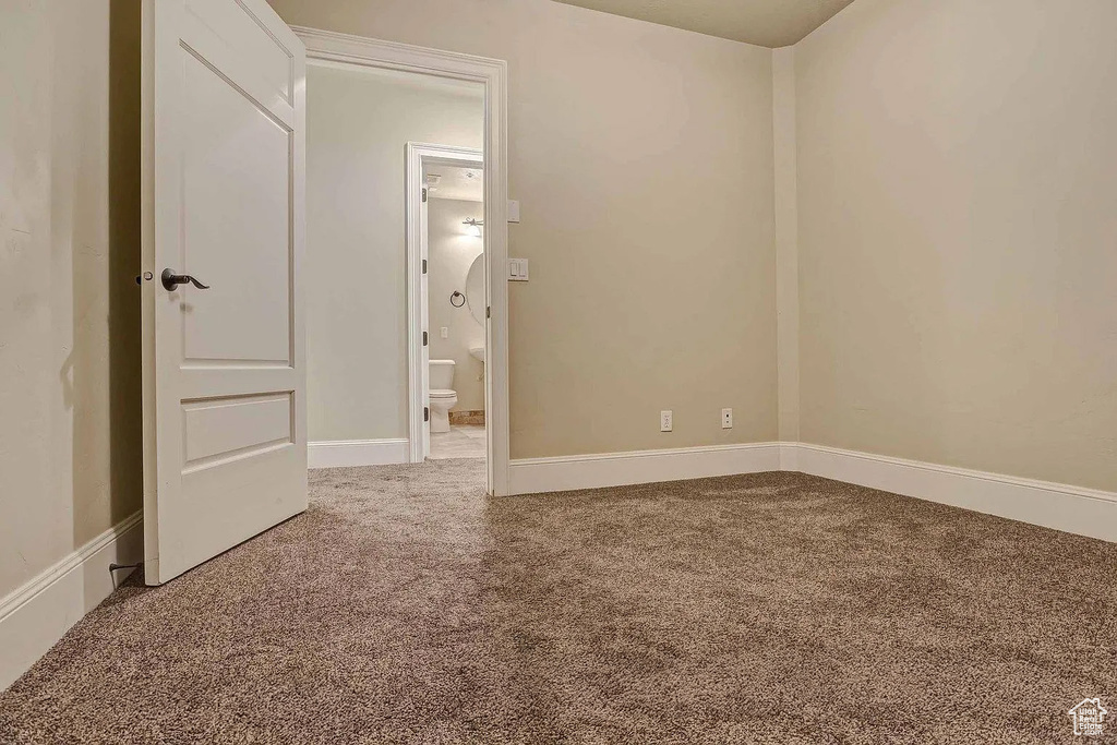 View of carpeted spare room