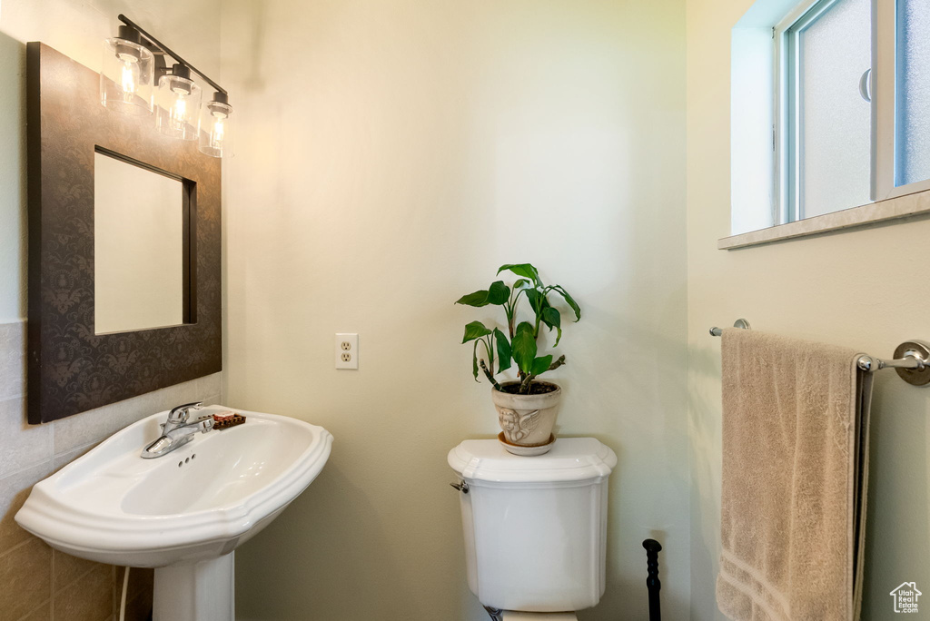 Bathroom with toilet and a sink