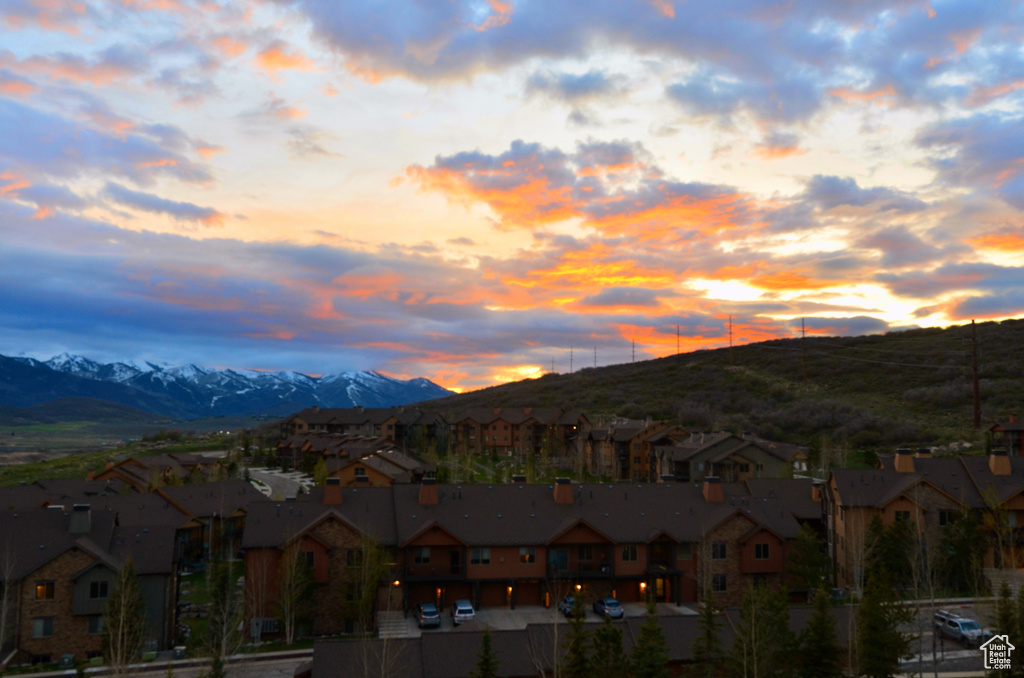 View of mountain background featuring nearby suburban area