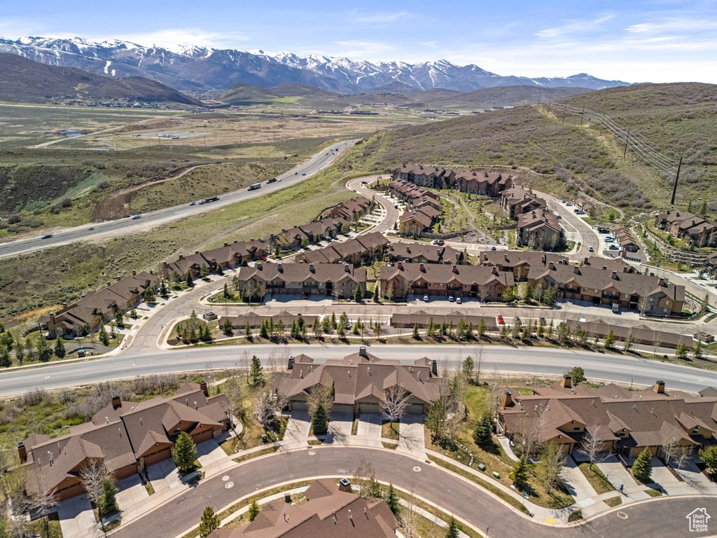Birds eye view of property featuring a mountain view and a residential view