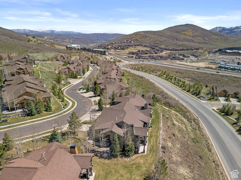 Drone / aerial view featuring a mountain view and a residential view