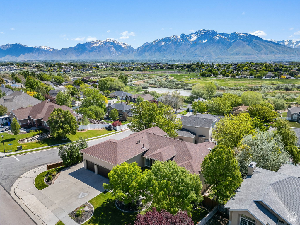 Aerial view of residential area with a mountainous background