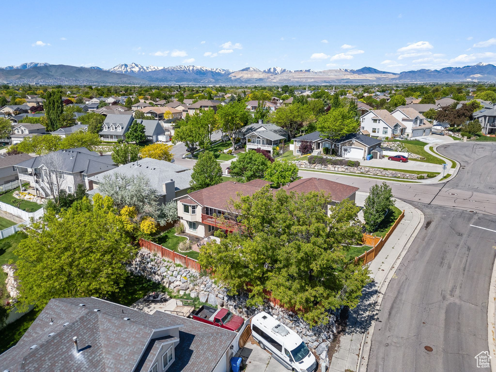 Aerial view of residential area with a mountain backdrop