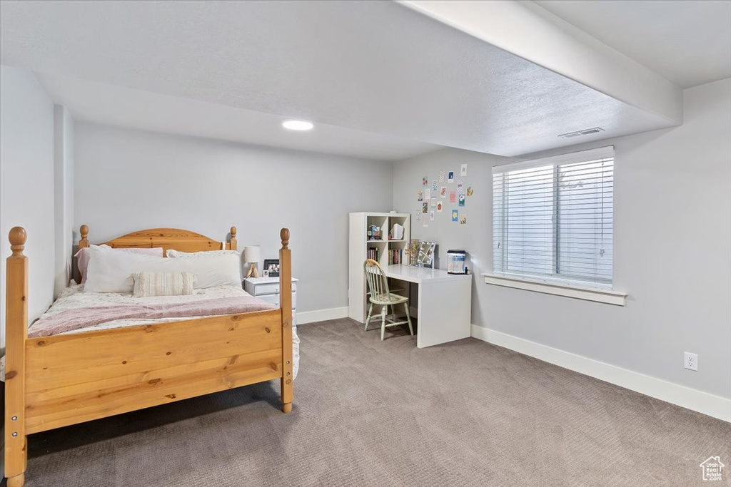Bedroom featuring carpet, baseboards, and recessed lighting