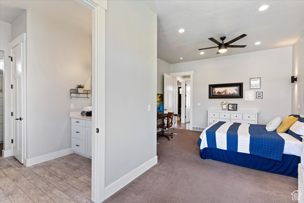 Bedroom with recessed lighting, baseboards, and light wood-style flooring