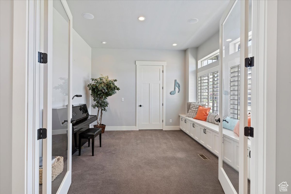 Mudroom featuring dark carpet, french doors, baseboards, and recessed lighting