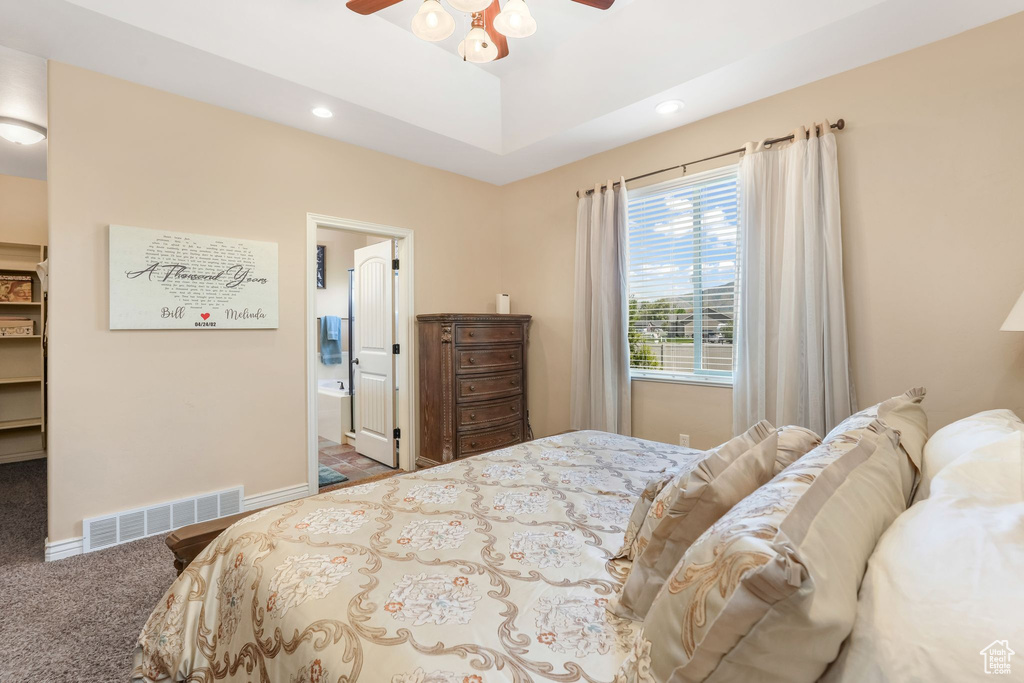 Bedroom featuring carpet flooring, a walk in closet, baseboards, recessed lighting, and a ceiling fan