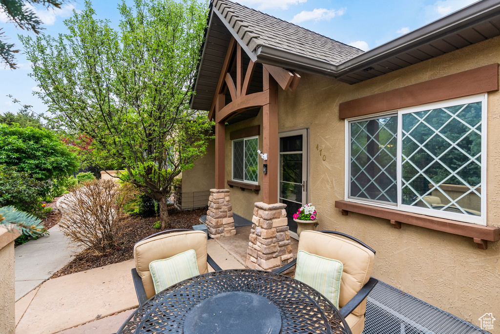 View of patio with outdoor dining area