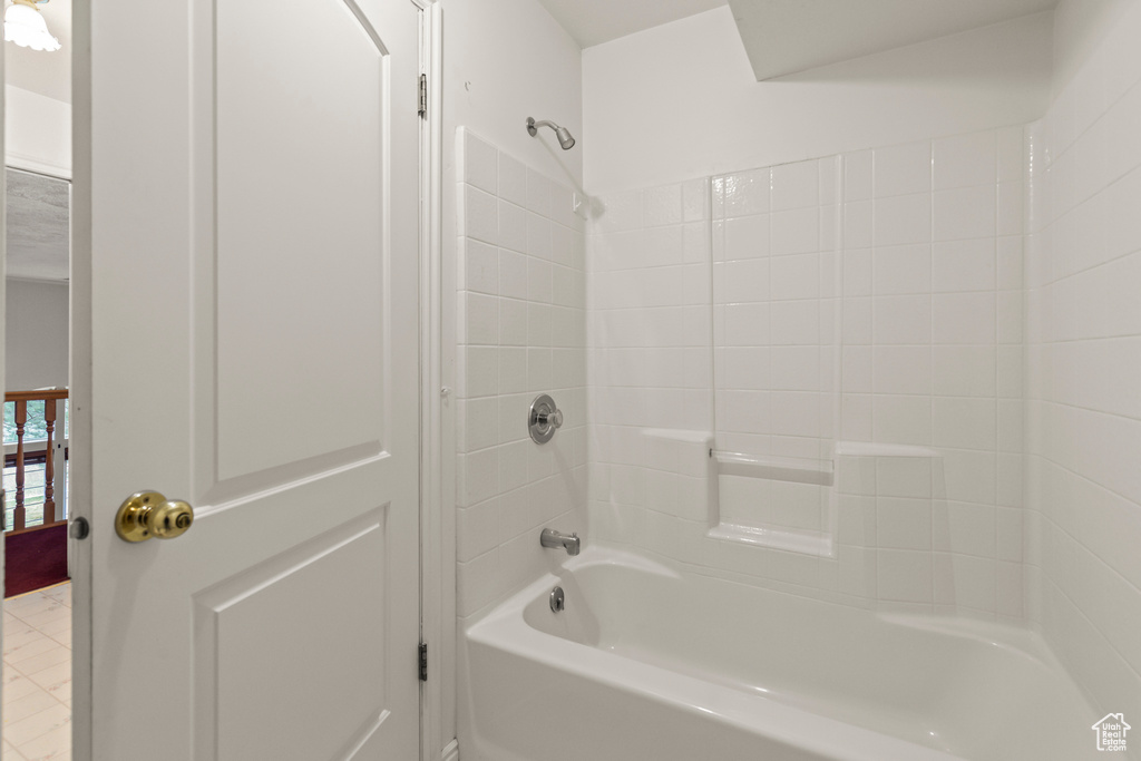 Bathroom featuring shower / bath combination