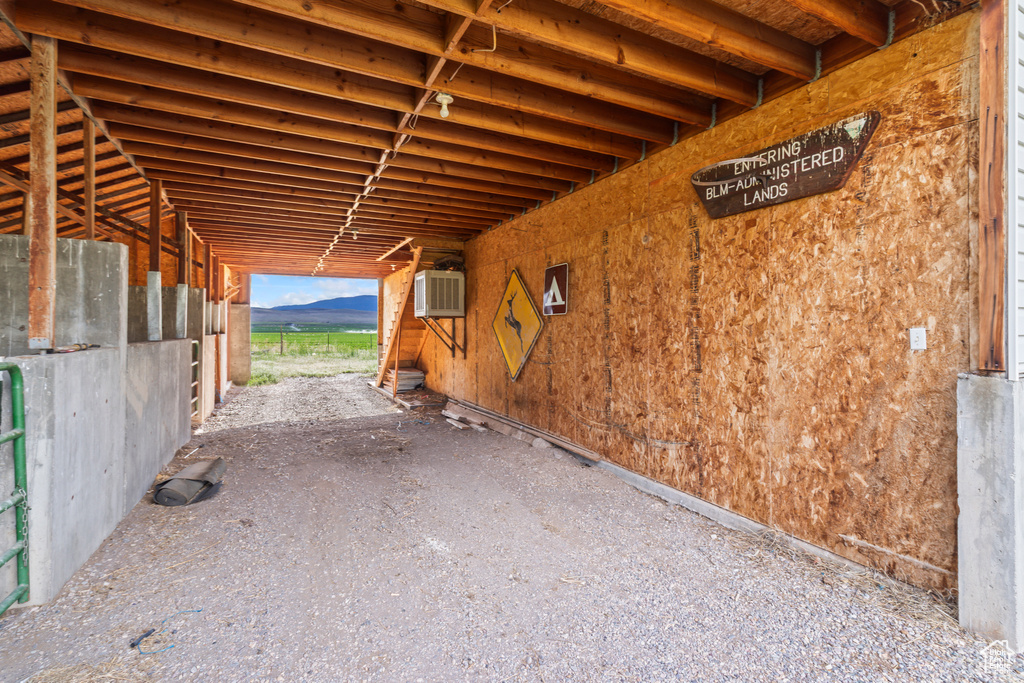 Stable with a wall unit AC and a mountain view