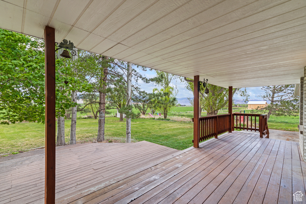 Wooden terrace with a yard