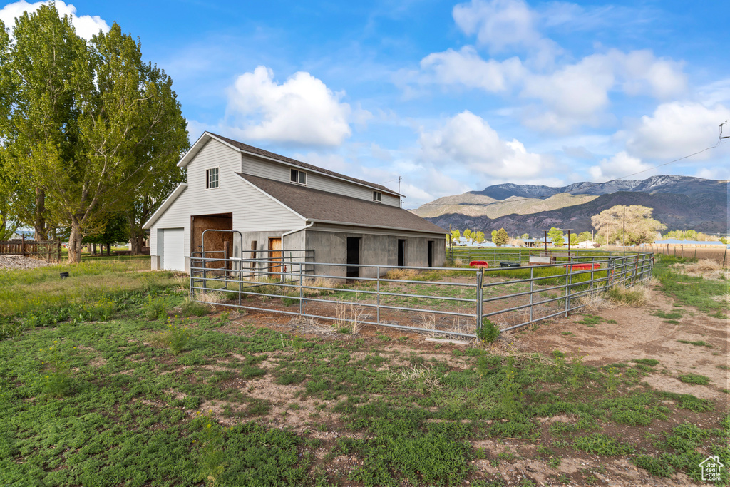 Stable featuring a mountain view