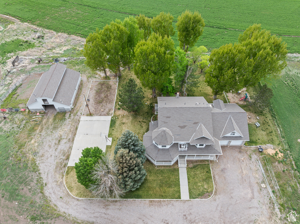 Aerial view of property and surrounding area with rural landscape