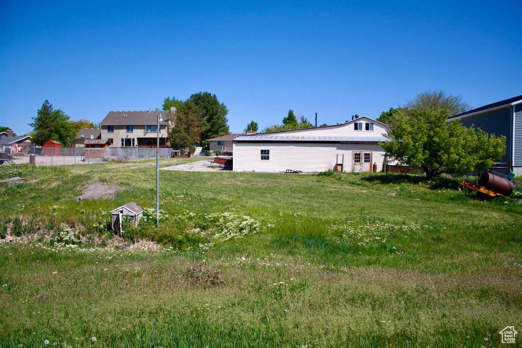 View of yard with fence