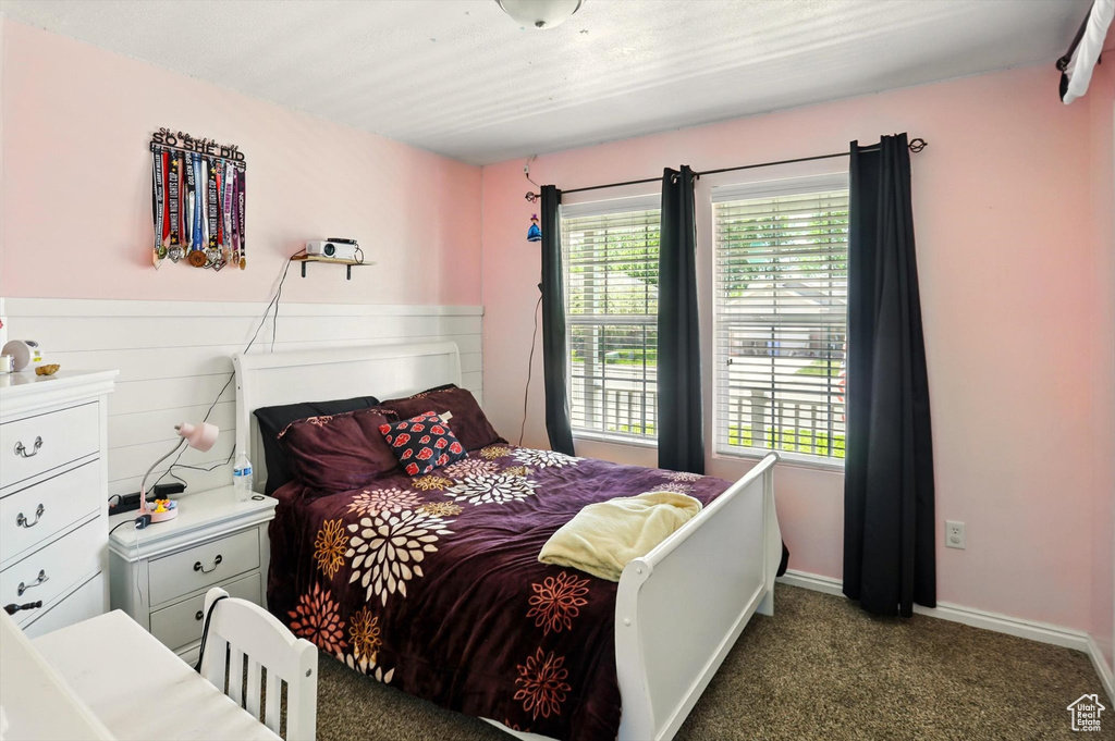 Bedroom with carpet flooring