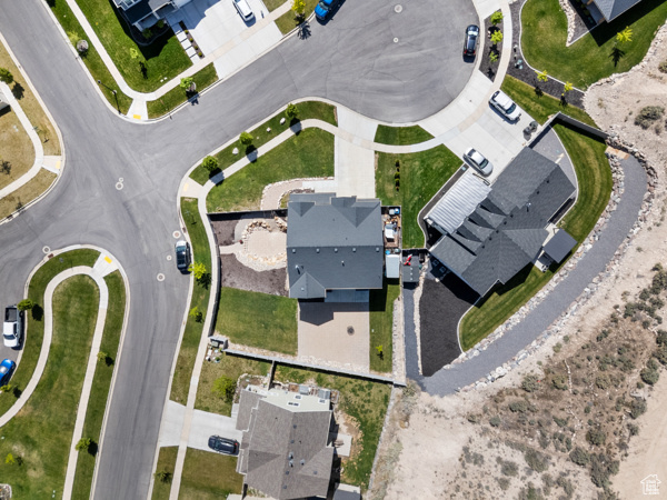 Aerial overview of property\'s location featuring nearby suburban area