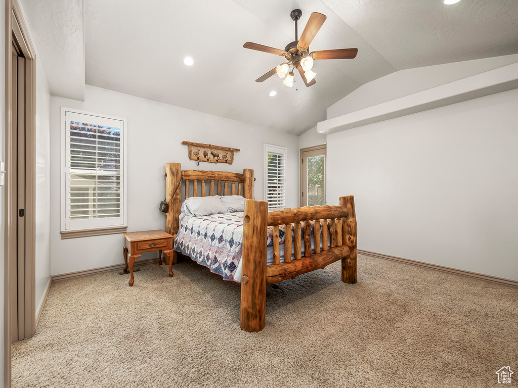Carpeted bedroom featuring vaulted ceiling, baseboards, recessed lighting, and ceiling fan