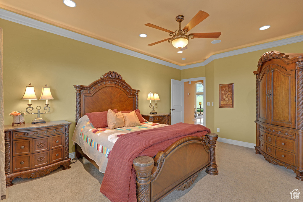 Bedroom featuring light carpet, recessed lighting, ornamental molding, ceiling fan, and baseboards