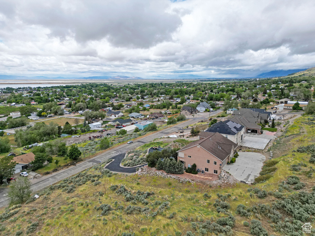 Aerial view of residential area with a mountainous background