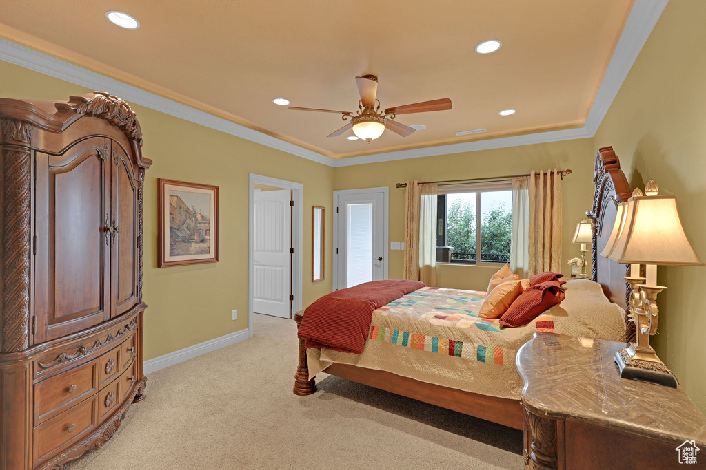 Bedroom featuring light colored carpet, recessed lighting, baseboards, ornamental molding, and a ceiling fan