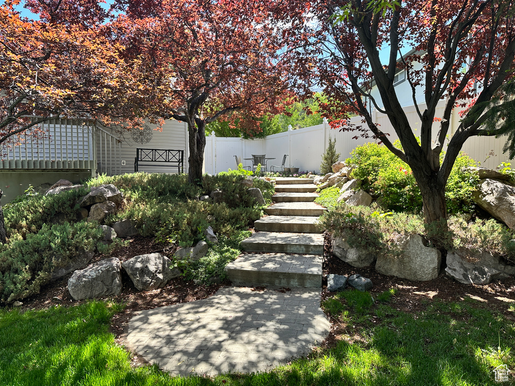 View of yard featuring fence