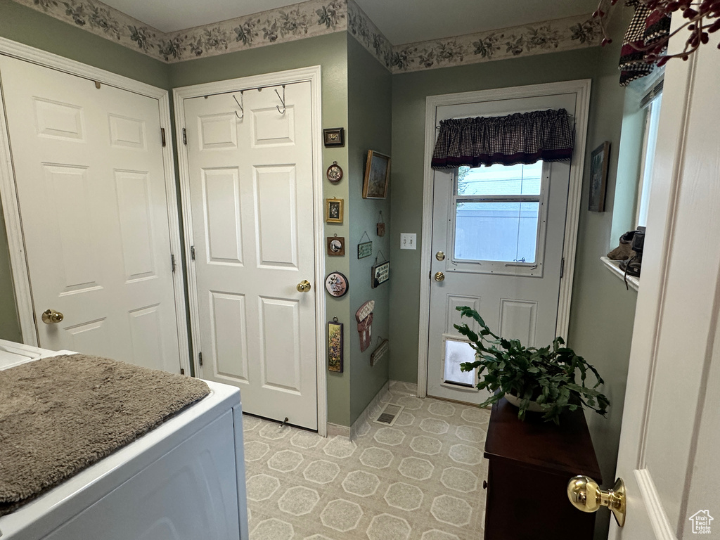 Foyer featuring baseboards