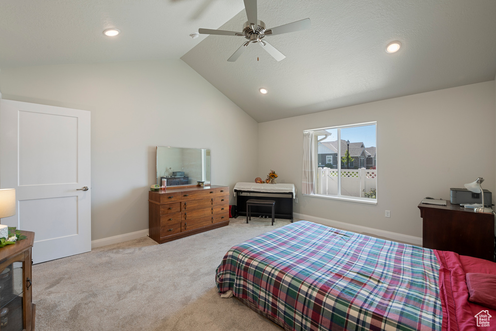 Bedroom featuring vaulted ceiling, carpet flooring, a ceiling fan, baseboards, and recessed lighting