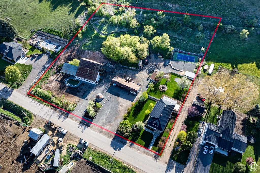 Aerial view of property\'s location with property parcel outlined