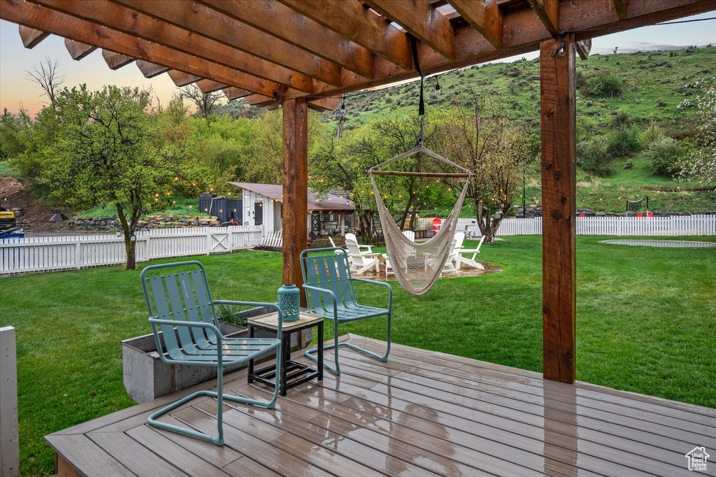 Deck featuring a gazebo and a pergola