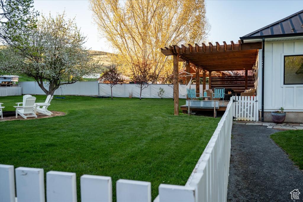 View of yard featuring a pergola