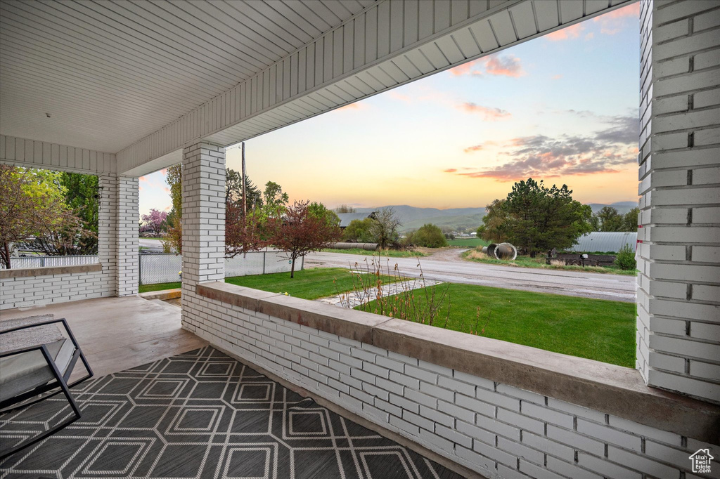 View of patio with covered porch