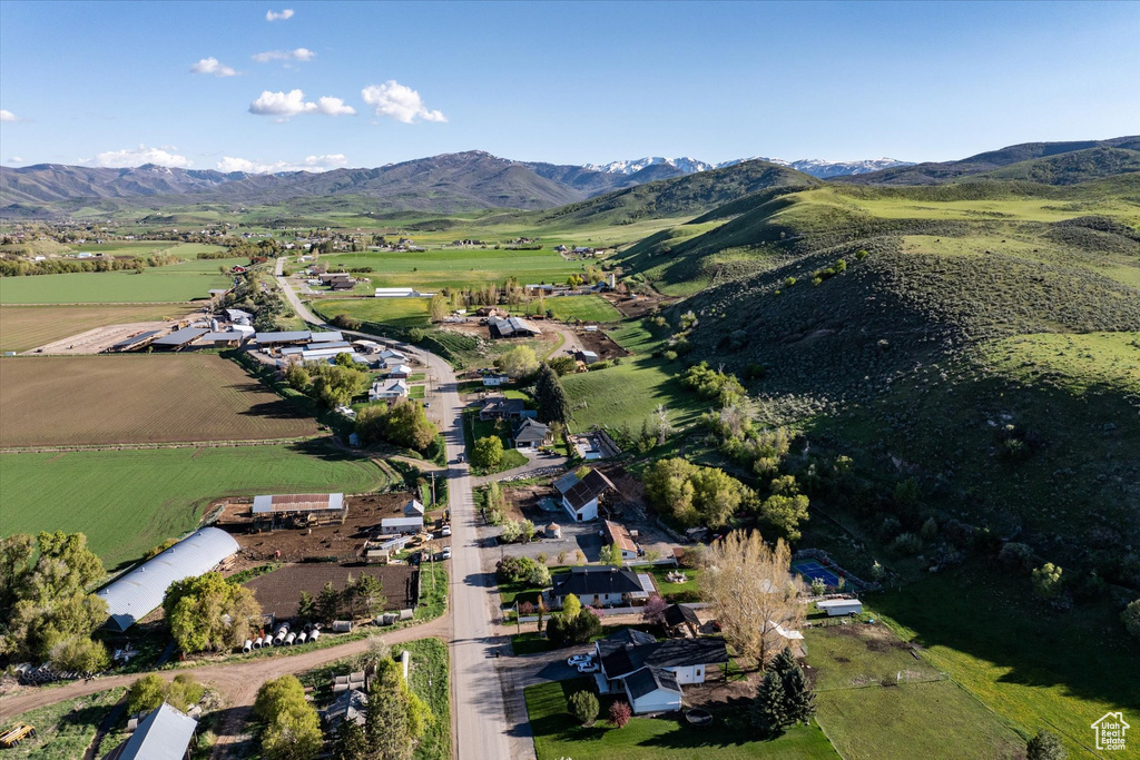 View of property location featuring a mountainous background and rural landscape