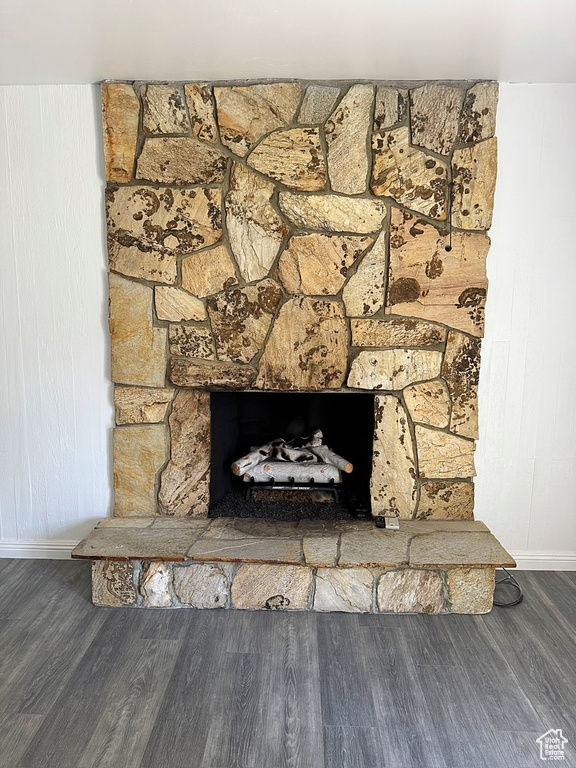 Detailed view of baseboards and wood finished floors
