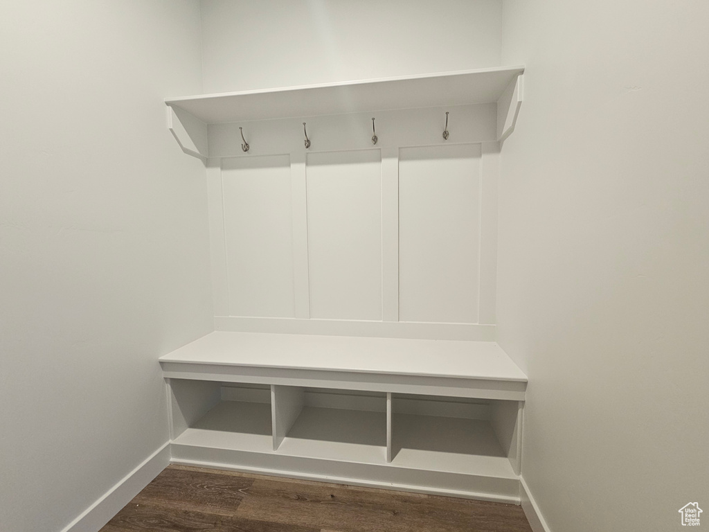 Mudroom with baseboards and dark wood finished floors