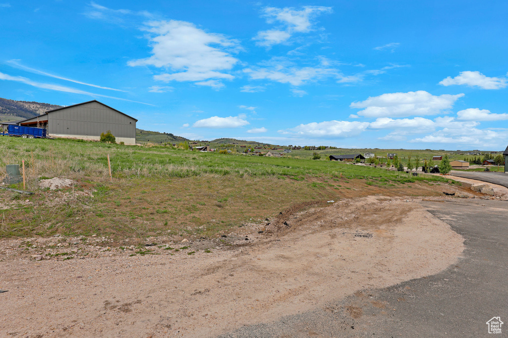 View of yard featuring a view of rural / pastoral area