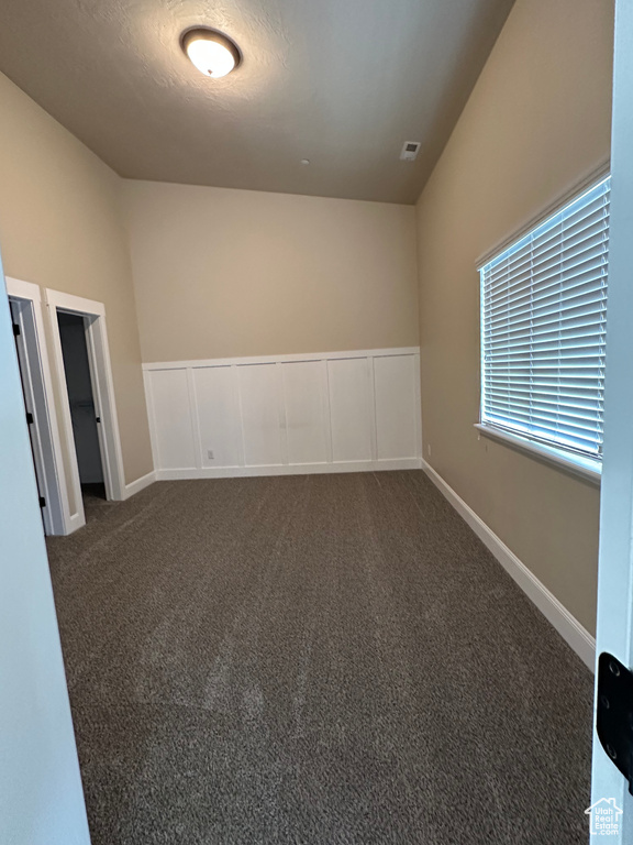 Spare room with carpet flooring