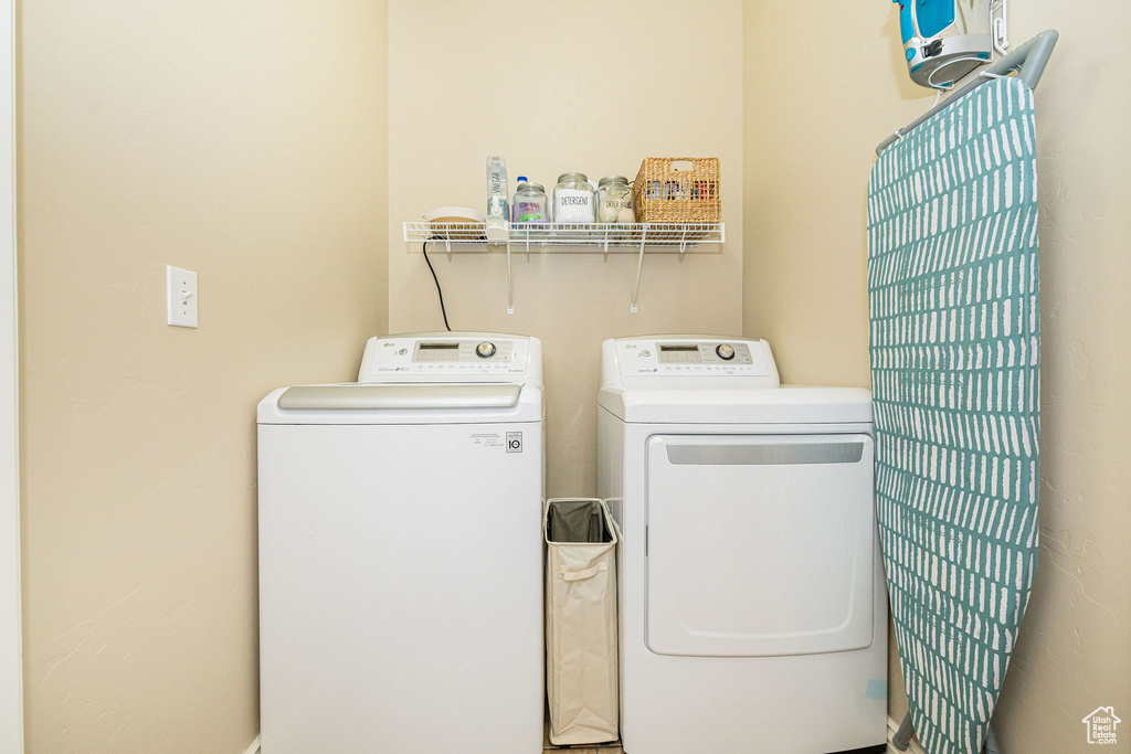 Laundry room featuring washing machine and dryer