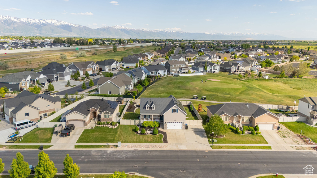 Aerial perspective of suburban area with mountains