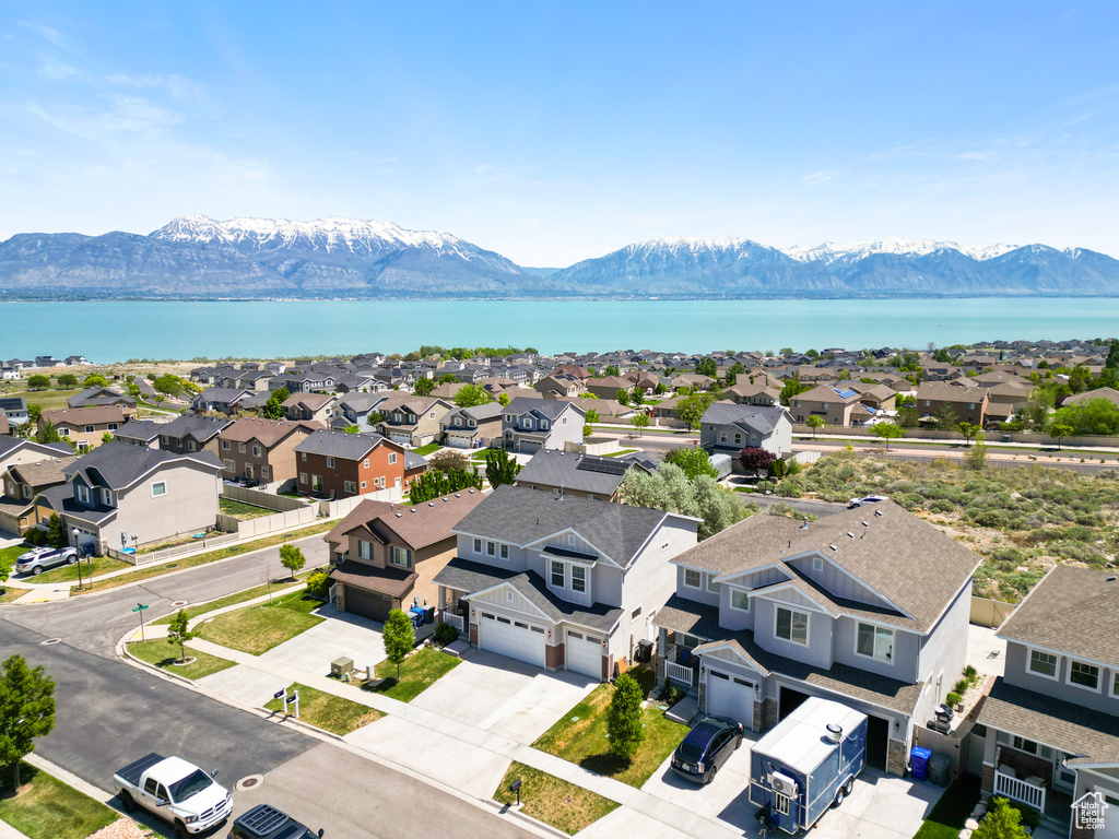 Aerial view of residential area with a water and mountain view