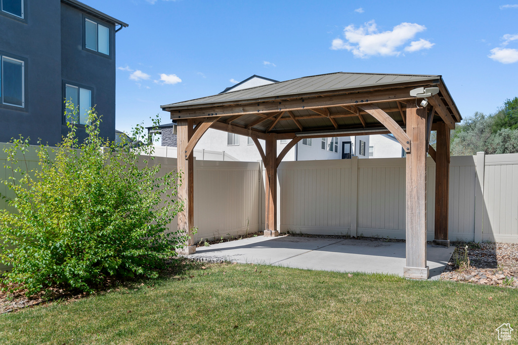 View of vehicle parking with a gazebo