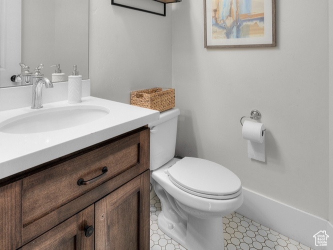 Bathroom with toilet and vanity