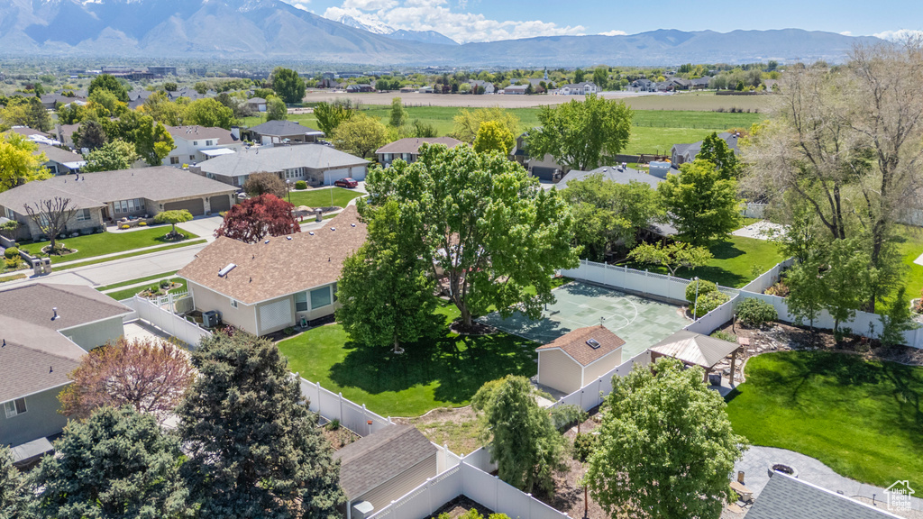 Aerial view of residential area with a mountain backdrop