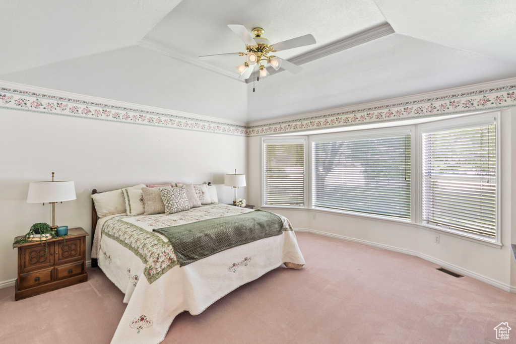 Bedroom with carpet floors, baseboards, and a ceiling fan