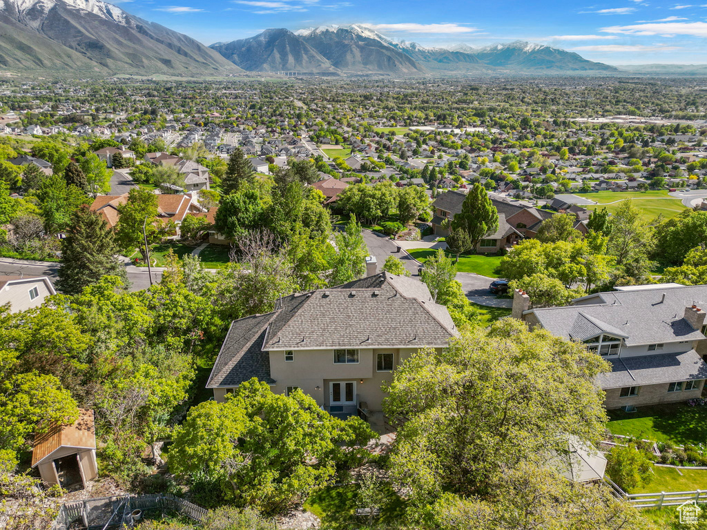 Aerial view of residential area with mountains